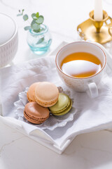 Macarons dessert and cup of tea