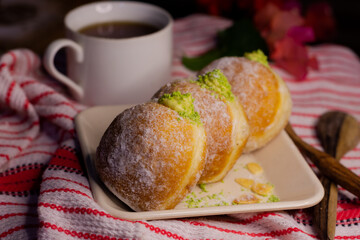 close up bombolonie on wooden plate in the table