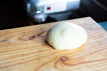 pattern of donnut dough on bake sheet with white flour