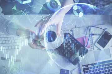 Double exposure of man and woman working together and financial chart hologram drawing. market analysis concept. Computer background. Top View.