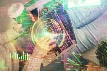 Naklejka premium Double exposure of woman hands working on computer and data theme hologram drawing. Tech concept.