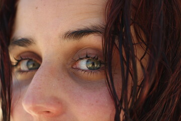 Young woman in the sun portrait close up