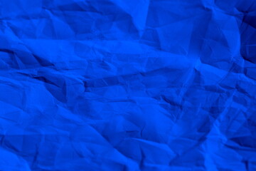 Blue crumpled paper texture background.