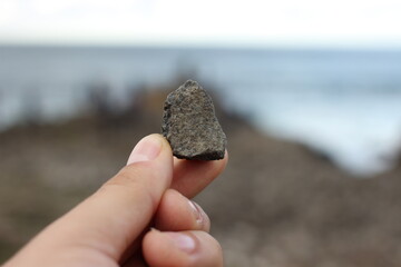 Single Pebble in hand Causeway Ireland