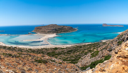 Fototapeta na wymiar Panoramic view of Balos Lagoon near Chania, with magical turquoise waters, lagoons, tropical beaches of pure white, pink sand and Gramvousa island on Crete, Cap tigani , vivd colors. Greece