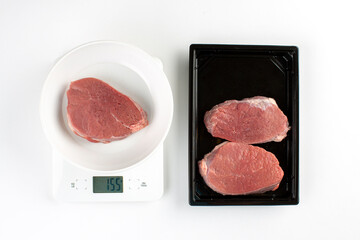 Beefsteak on scale, meal plan concept  