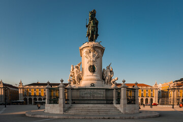 King Jose I Statue at Praca do Comercio in front of Triumphal Arch near waterfront. Old town of Lisboa in historic midtown Alfama district. Commerce square.
