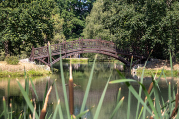 View of a wooden bridge in a park in Leipzig Germany