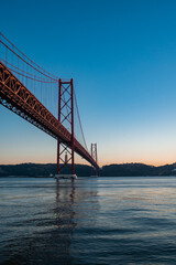 Panorama view over the 25 de Abril Bridge. The bridge is connecting the city of Lisbon to the municipality of Almada on the left bank of the Tejo river, Lisbon