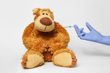Vaccination of a teddy bear against covid