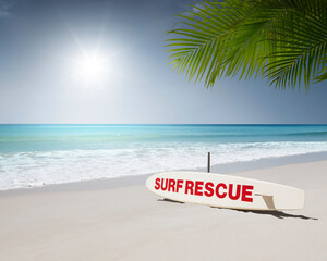 Obraz premium Close up view of rescue surf board on tropic beach background