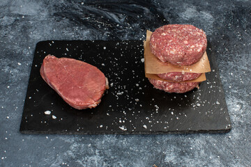 Minced beef meat for burger on black background