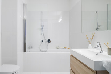 Stylish bathroom with bathtub and shower - 409210261