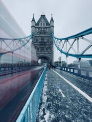 Fototapeta na wymiar Blurred Double Decker on Tower Bridge.