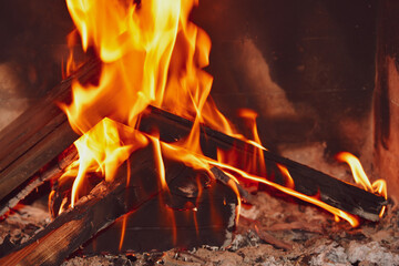 Blazing fire in fireplace.