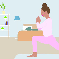 woman does yoga at home during covid-19 quarantine