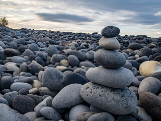 Zen-like stack of pebbles, meditation mood on shore