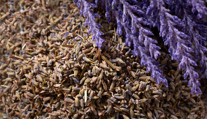 a pile of dried lavender flowers. a healthy food supplement.