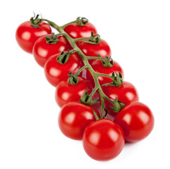 Fresh cherry tomatoes with a sprig isolated on a white background. View from another angle in the...