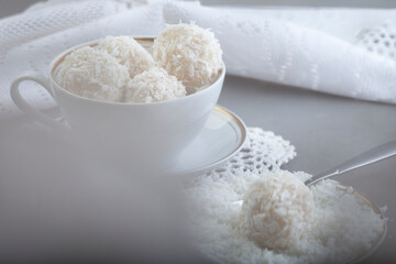 Delicious no-bake sweets, white chocolate truffles topped with grated coconut
