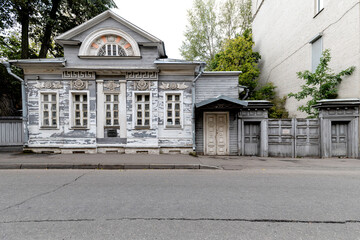 Old wooden mansion with shabby walls
