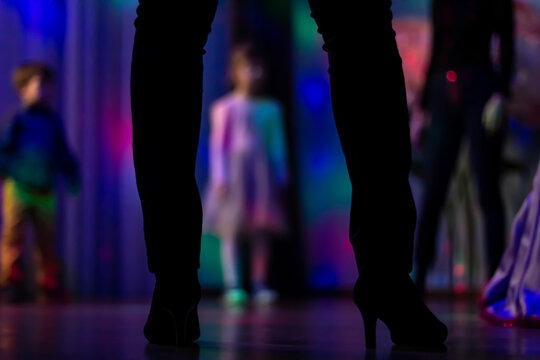 Feet of a woman at a disco