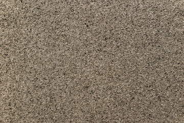 Bronze sparkling background from small sequins. Brown metallic backdrop