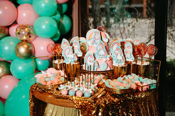 Candy Bar with Sweets. Cake, cookies, lemonade, creamy muffins, fresh berries for celebratory birthday. Candy Bar on the Outdoors.