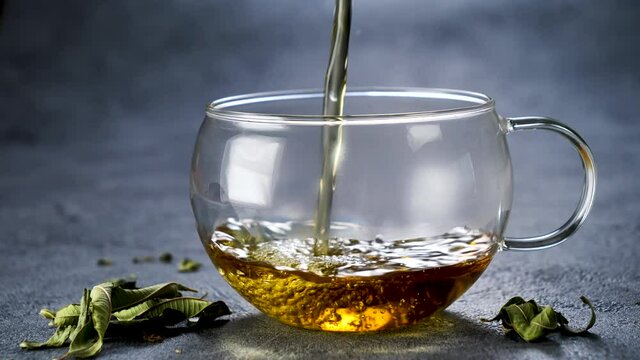 pouring tea in a cup