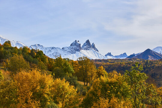 Mountain landscape of Aiguilles d Arves and autumn trees in French Alps - Albiez - Savoy