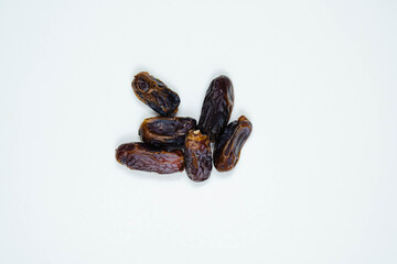 Dates or kurma on white background. Copy space