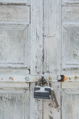 Padlock on the door. 