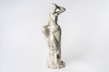 White tabletop ancient statue of a woman on a white isolated background