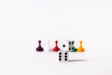 Fototapeta premium Colored playing chips and dice on a white background