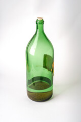 Vintage old bottle made of green glass
