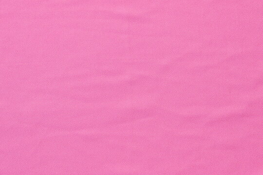 close up of pink fabric texture and background