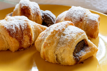 chocolate croissant on the plate. selective focus.