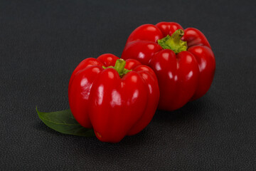 Ripe Red bell pepper over wooden