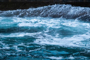 sea with big waves in a storm in the evening