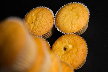 cupcakes on a black background. Baking 