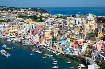 Traditional colorful houses in the port of Corricella, Procida, Italy