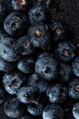 Fresh natural antioxidant blueberries pile, macro detailed close up
