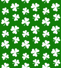 Vector seamless pattern of flat white Irish shamrock clover isolated on green background