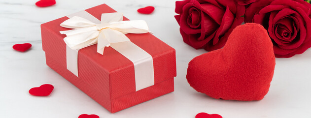 Valentine's Day design concept background with rose flower and gift box.