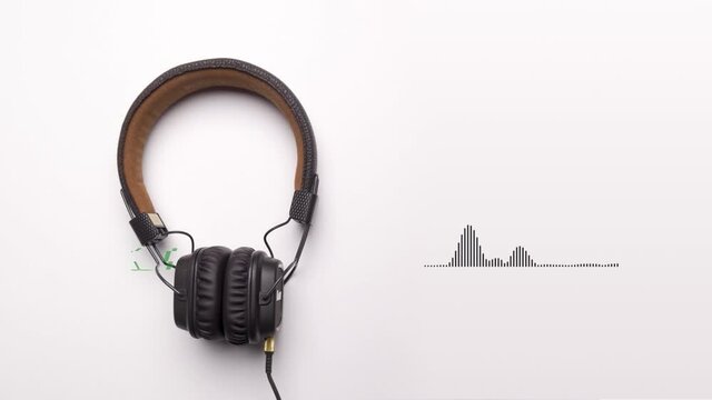 Abstract but realistic headphones with moving colorful digital bars and, equalizer theme. Animation. Visualization for music player with glitch effect, seamless loop.