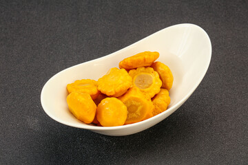 Marinated yellow patisson in the bowl