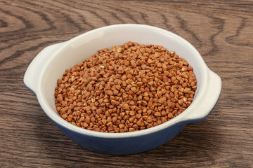Raw buсkwheat cereal in the bowl