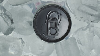 Obraz premium Aluminum Soda Tin Can Rotating in cool Ice motion footage
