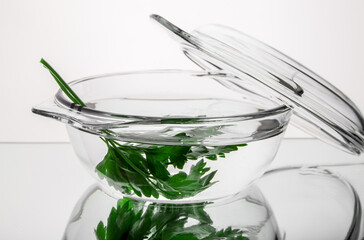 Glass plate / pan from heat-resistant glass for microwave and oven on a white background