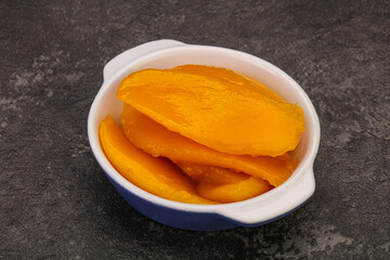 Sweet mango slices in syrop